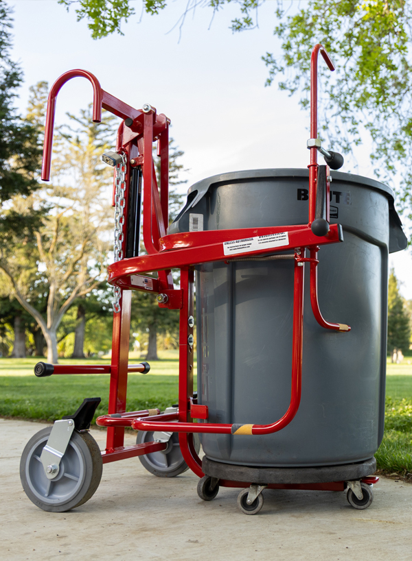 Eagle Lift holding garbage can